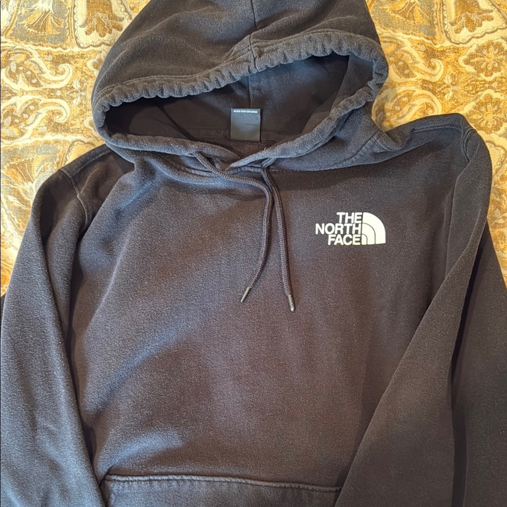 The North Face Black Sweater with Classic Pullover Design